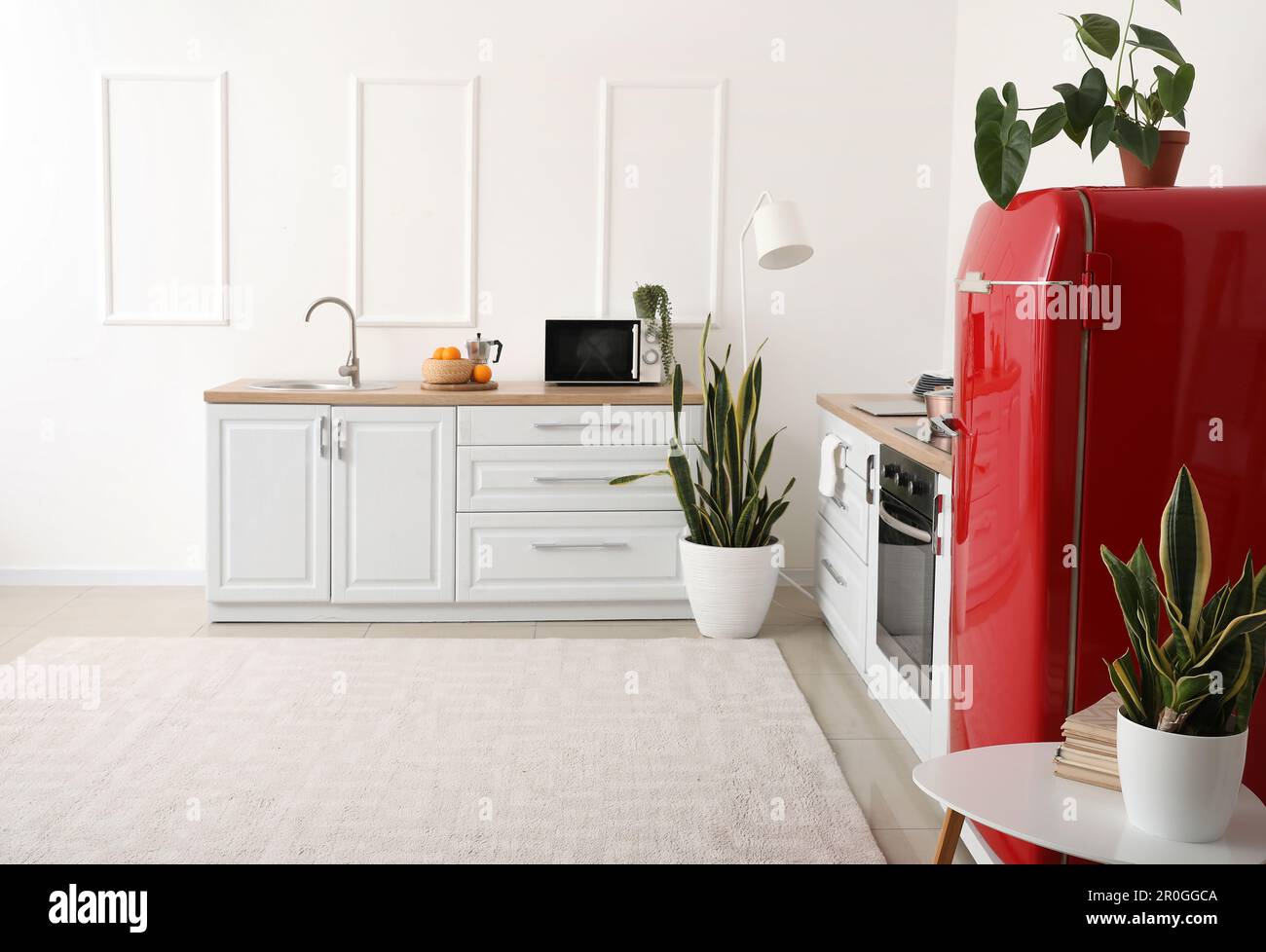 Interior of modern kitchen with stylish refrigerator Stock Photo - Alamy