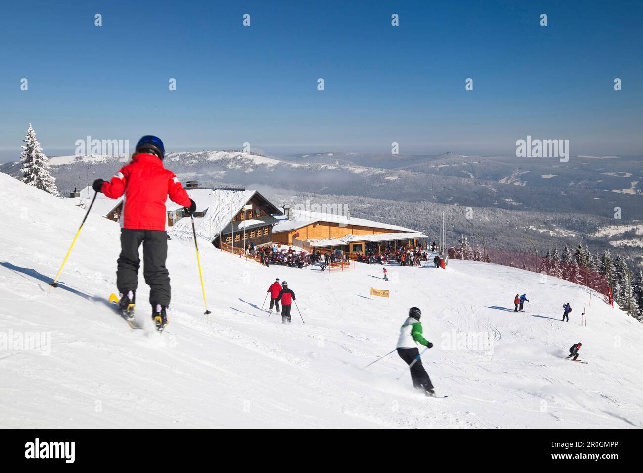 Skiers at skiing area Great Arber, Bavarian Forest, Bayerisch Eisenstein, Lower Bavaria, Germany, Europe Stock Photo