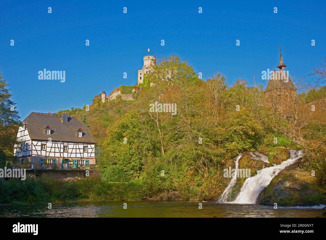 Pyrmont castle,  Mill, Chapel on bridge, Waterfall, Pond, Eifel, Rhineland-Palatinate, Germany, Europe Stock Photo