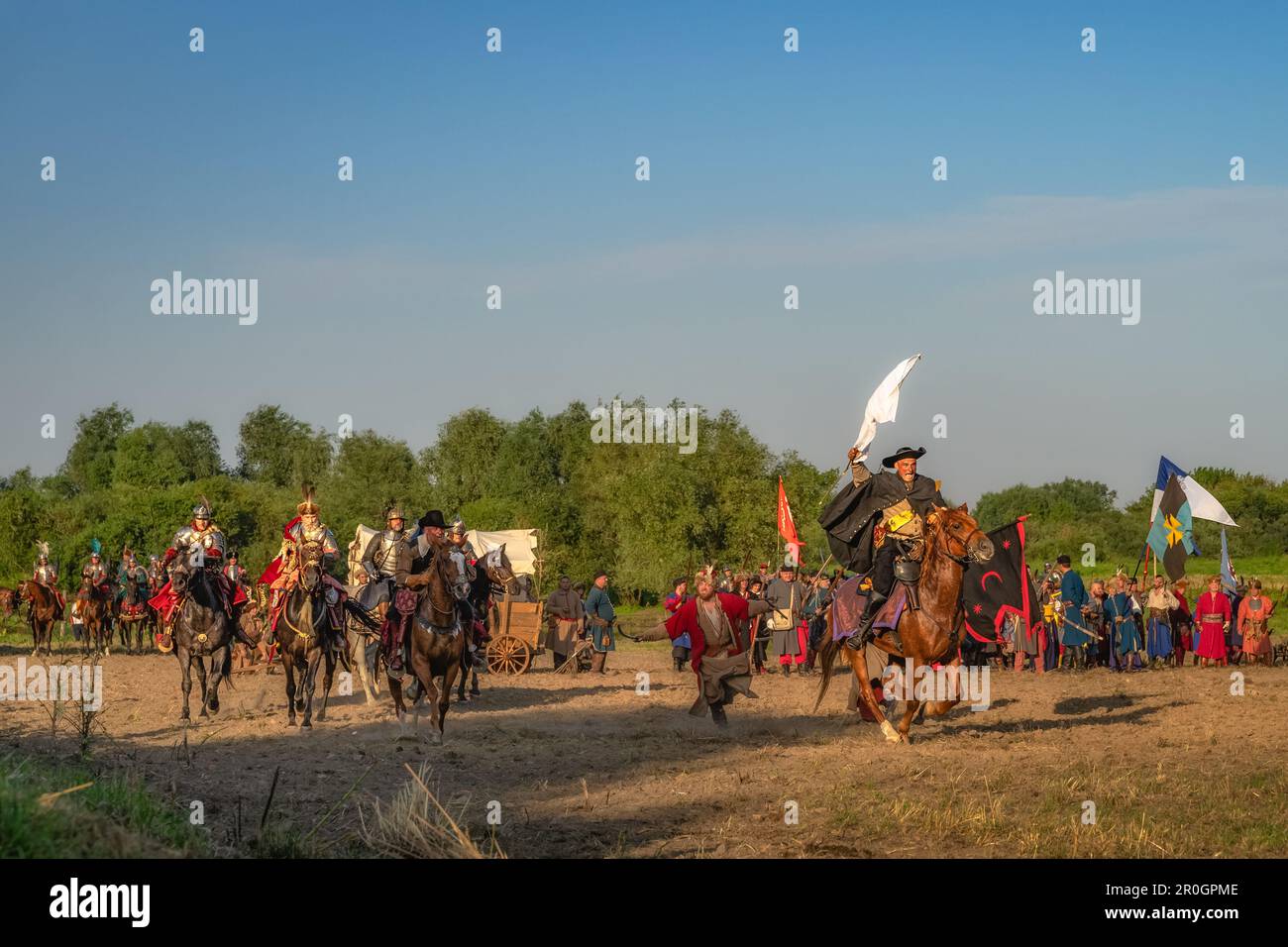 Gniew, Poland, Aug 2020 Horseman runs away with white flag from polish Hussars. Historical reenactment of Battle of Gniew, Polish Swedish war Stock Photo
