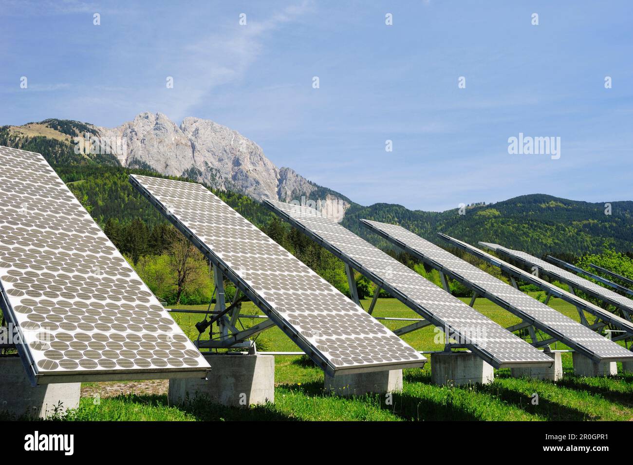 Solar panel in front of mountains, solar plant, photovoltaics, valley of Gailtal, Carinthia, Austria, Europe Stock Photo
