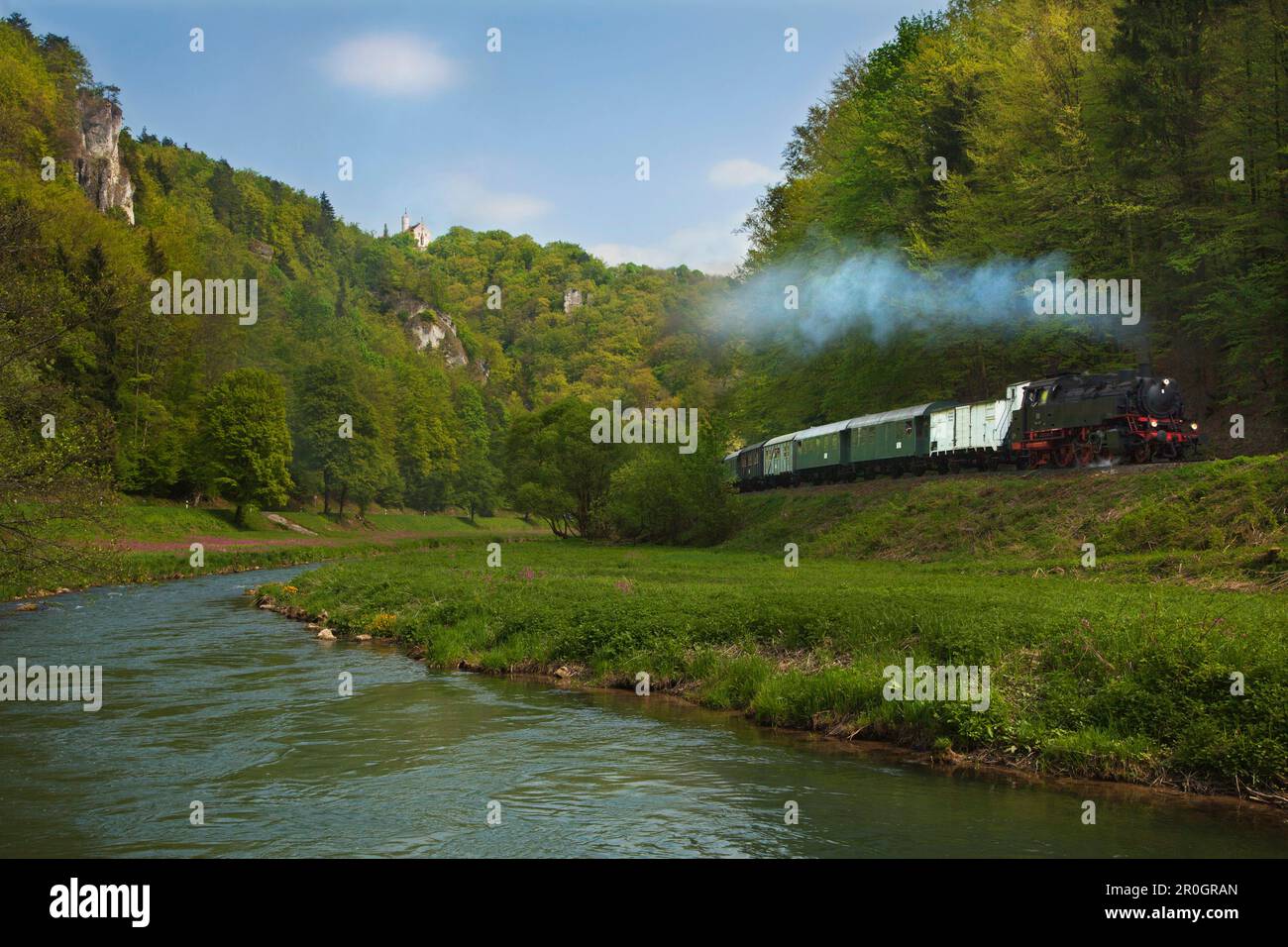 Historical steam train at Wiesent valley below Goessweinstein castle, Fraenkische Schweiz, Franconia, Bavaria, Germany, Europe Stock Photo