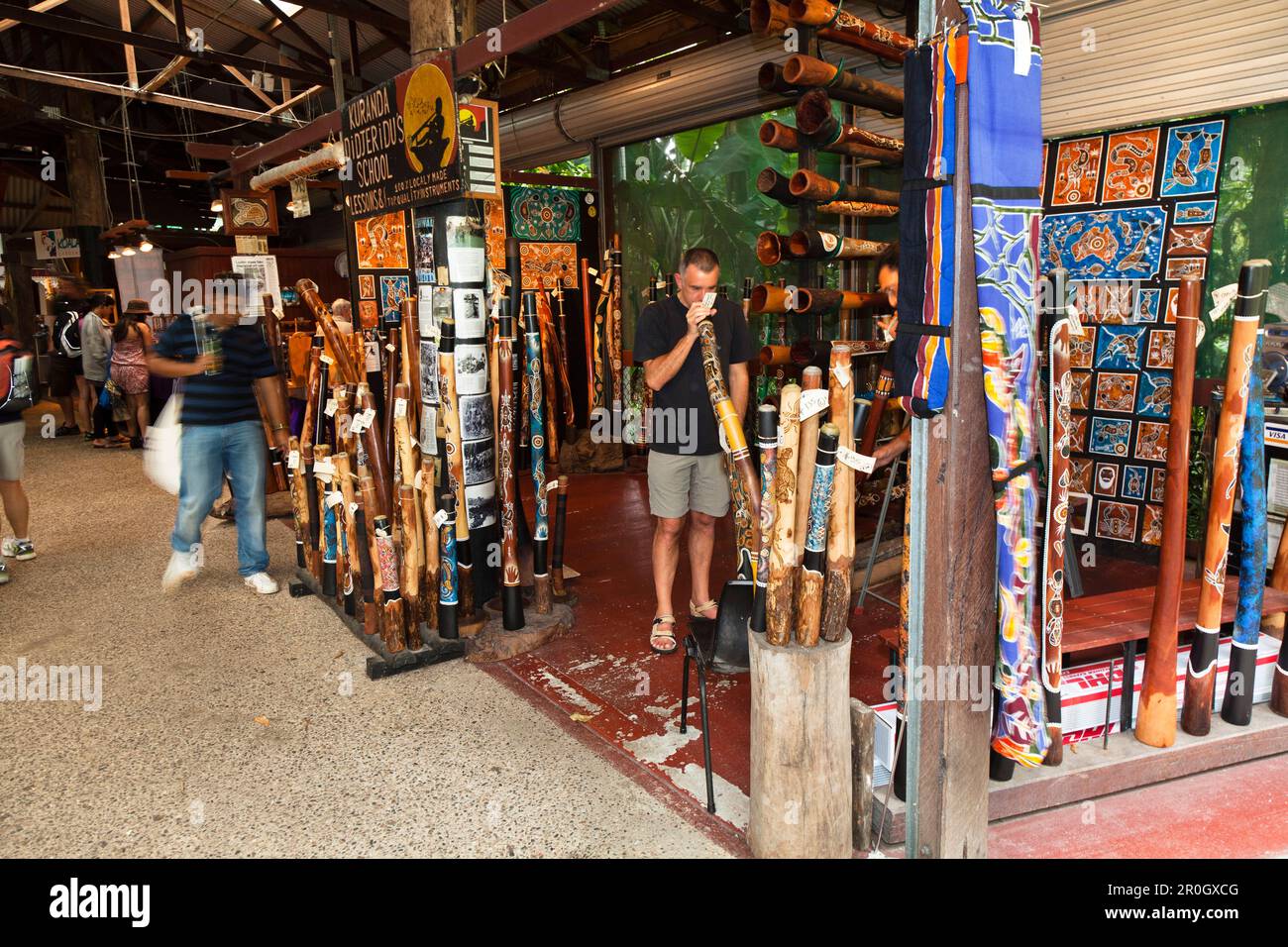 Tourist at Didgeridoo Shop, Kuranda Markets, North Queensland