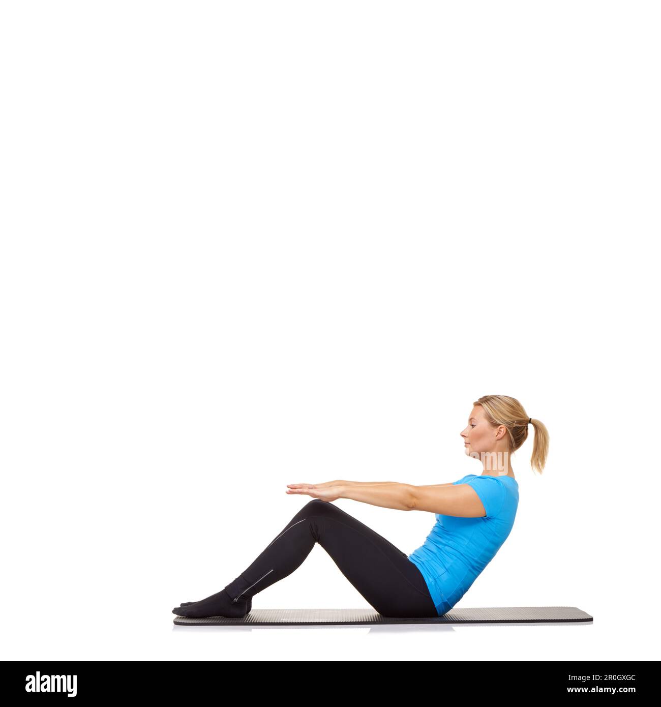 Sporty pregnant girl squatting, doing sit-ups isolated on white background.  Concept of healthy life Stock Photo - Alamy