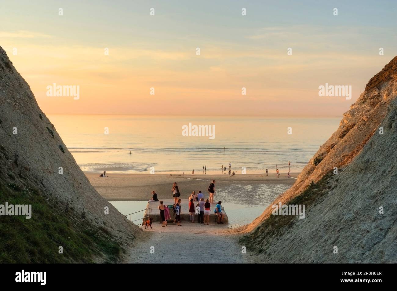 People on the beach at the Cap Blanc-Nez at sunset, Cap Blanc-Nez, Opal coast, Boulogne-sur-Mer, France, Europe Stock Photo