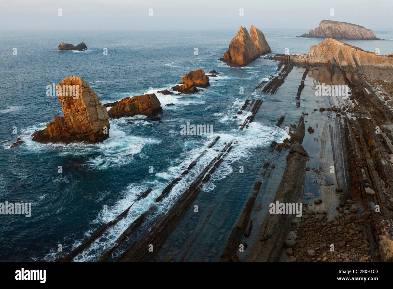 Rock formations along the coast of Arnia, Los Pielagos, Camino de la Costa, Camino del Norte, coastal route, Way of St. James, Camino de Santiago, pil Stock Photo