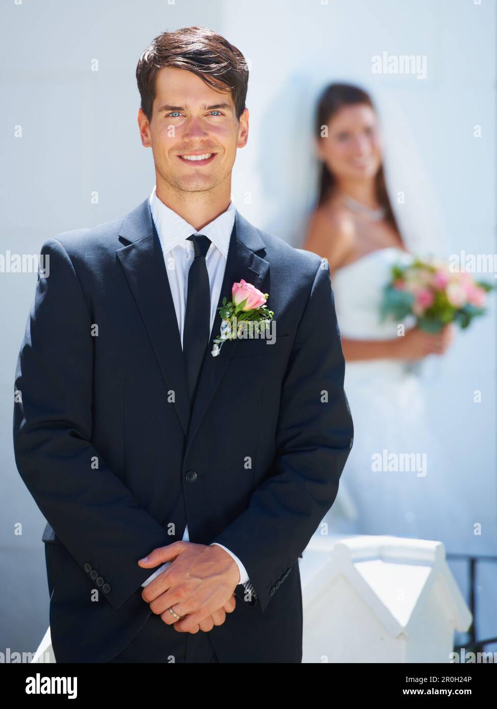 They Make A Great Team A Handsome Young Groom Smiling At You While His They make a great team a handsome young groom smiling at you while his