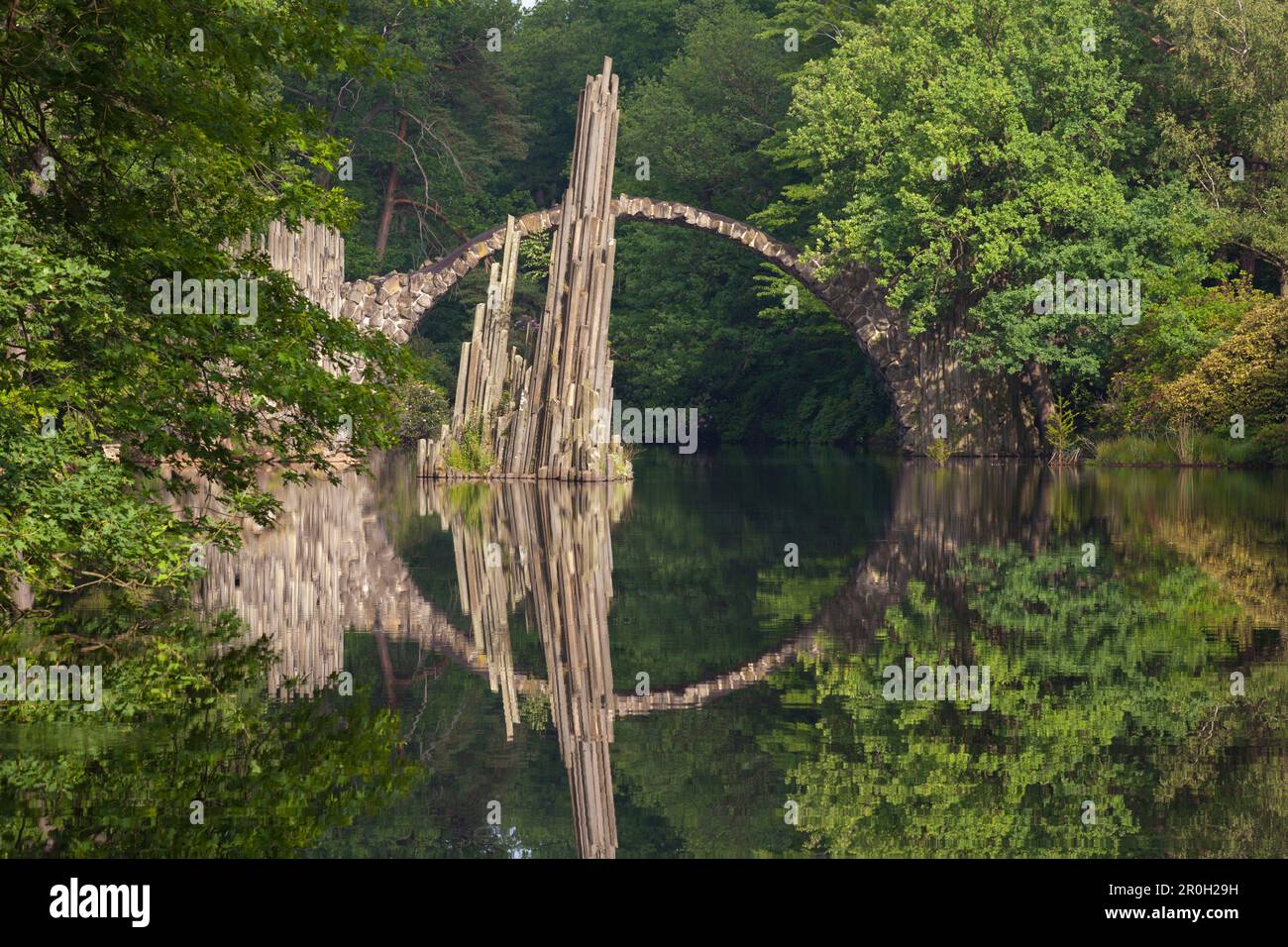 Rakotz bridge reflecting in lake Rakotzsee, Kromlau park, Kromlau, Saxony, Germany, Europe Stock Photo