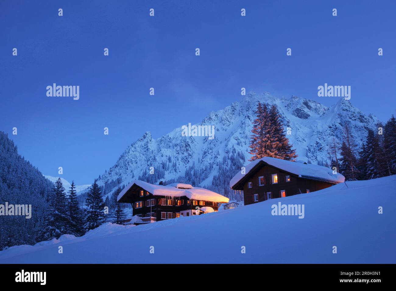 Holiday lodges in the evening, Gargellen, Montafon, Vorarlberg, Austria Stock Photo