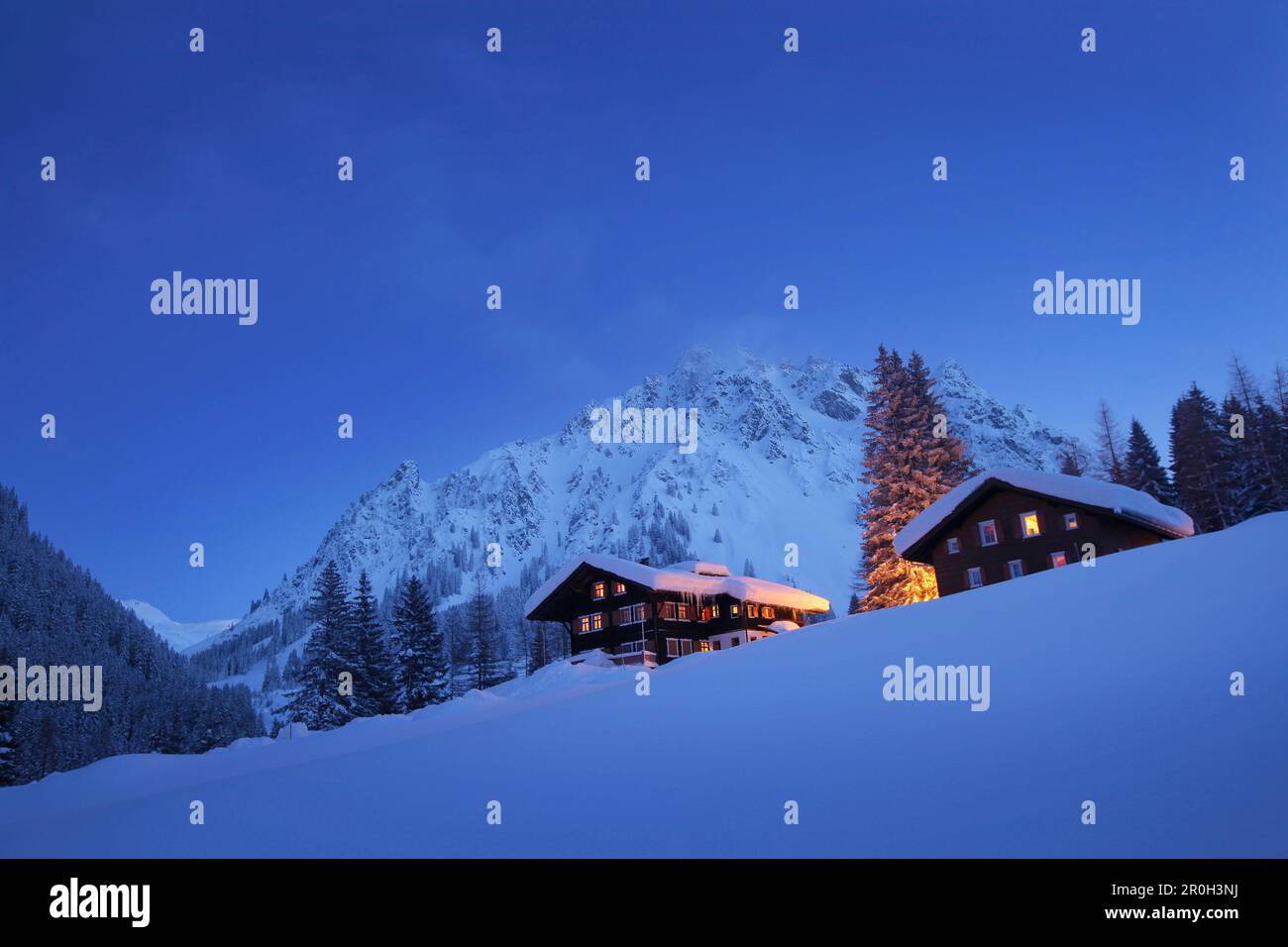 Holiday lodges in the evening, Gargellen, Montafon, Vorarlberg, Austria Stock Photo