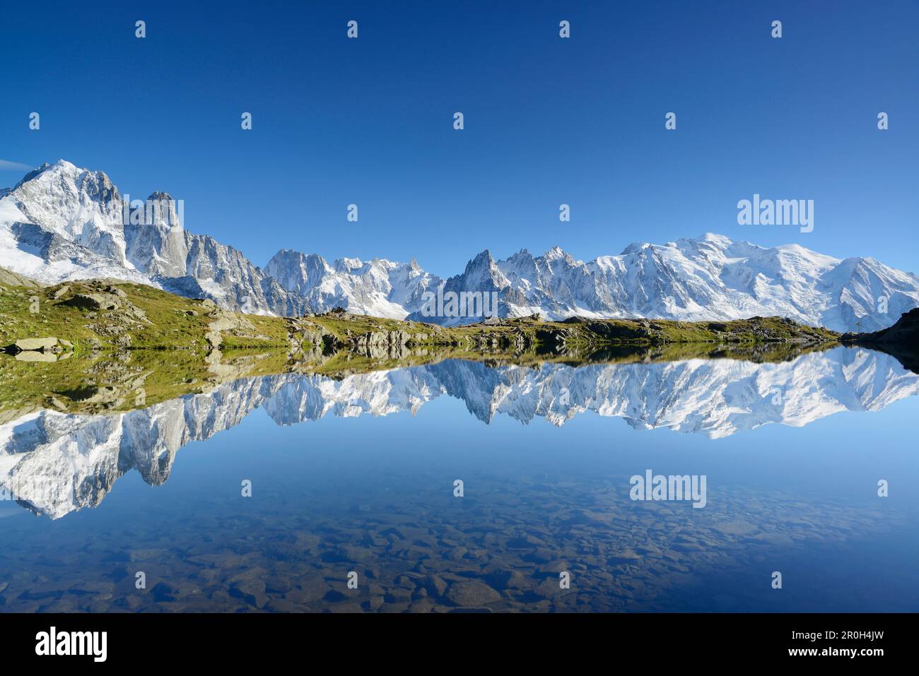 Mont Blanc range reflecting in a mountain lake Mont blanc range