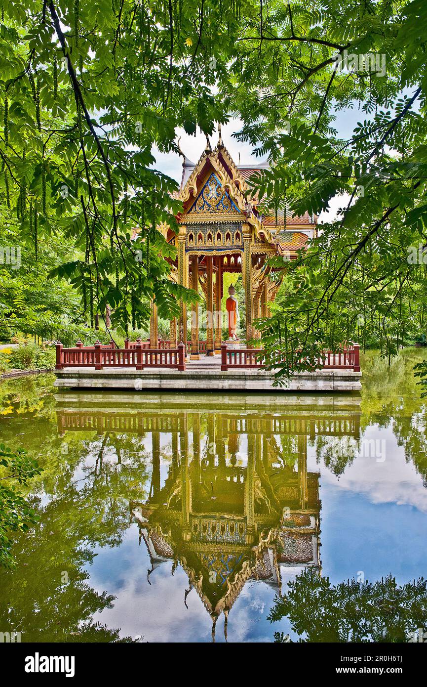 Thai Sala with Buddha statue on a platform in water, Westpark, Munich, Upper Bavaria, Bavaria, Germany Stock Photo