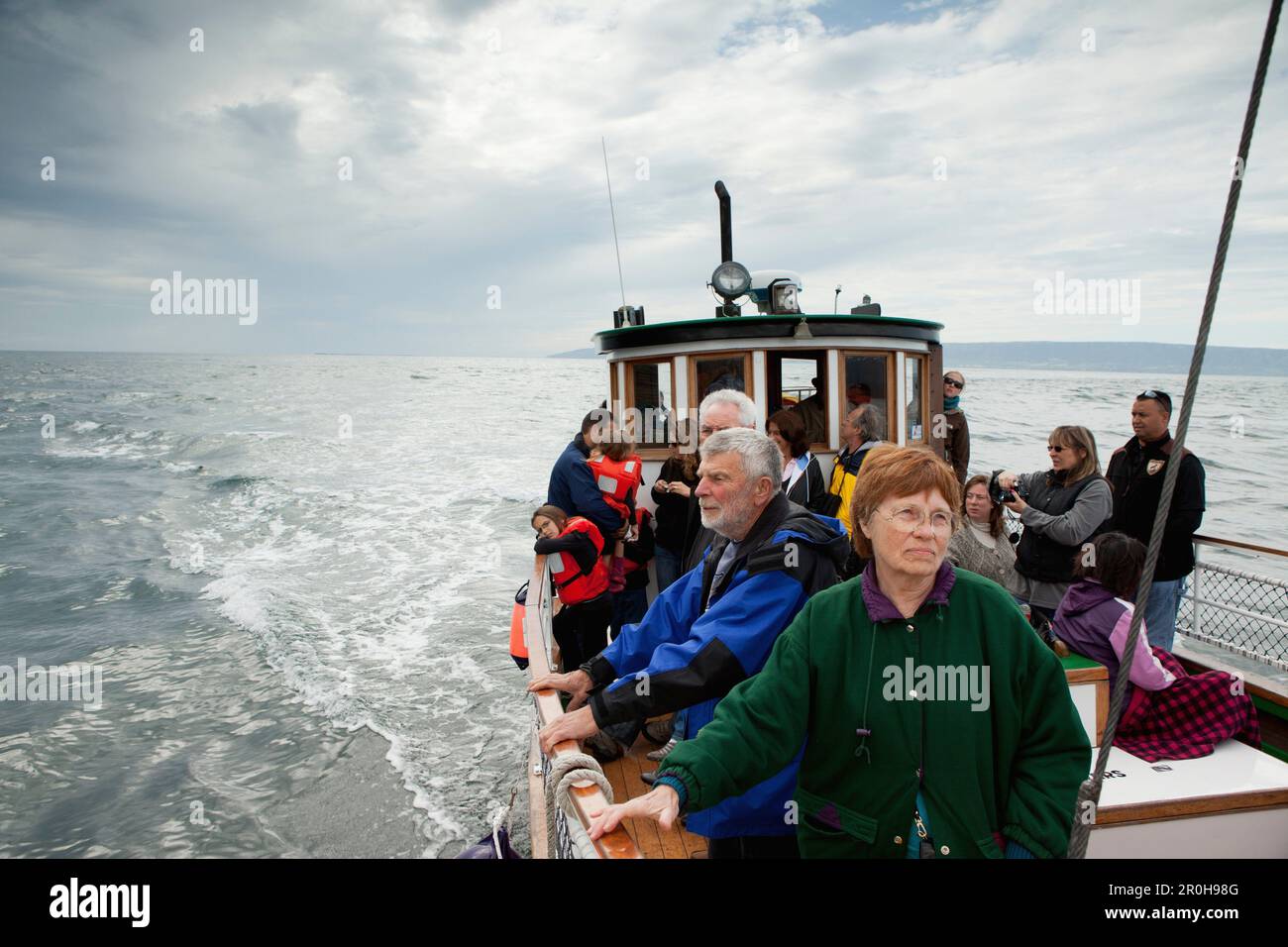 ALASKA, Homer, tourists take a ride on the Danny J boat from the Homer Spit to Halibut Cove