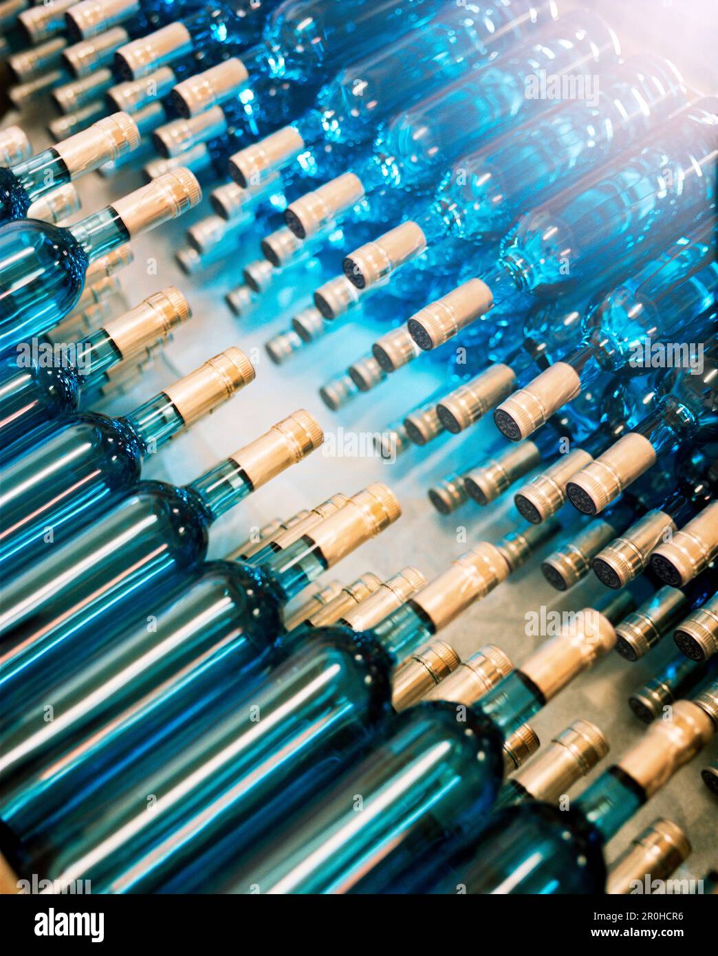 SWITZERLAND, Couvet, stacked bottles of Absinthe are ready to be labeled, Artemisia Distillerie, Jura Region Stock Photo