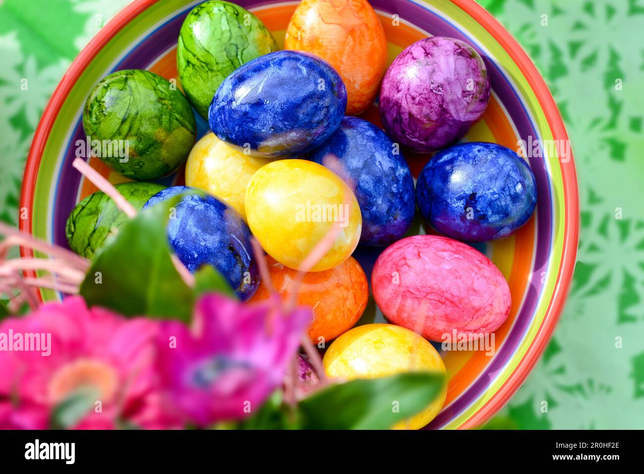 bowl with collected Easter eggs, Germany Stock Photo