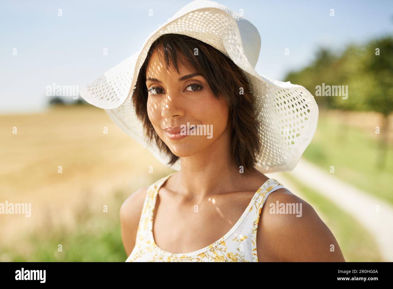 Sweet summer beauty. Portrait of a pretty woman in the outdoors Stock ...