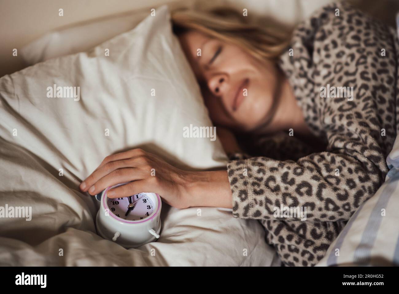 circadian rhythm, sleeping woman and alarm clock Stock Photo Alamy