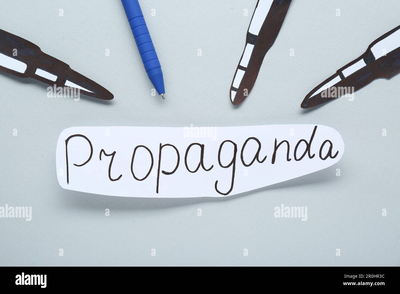 Information warfare concept, journalism and media influence. Pen and ...