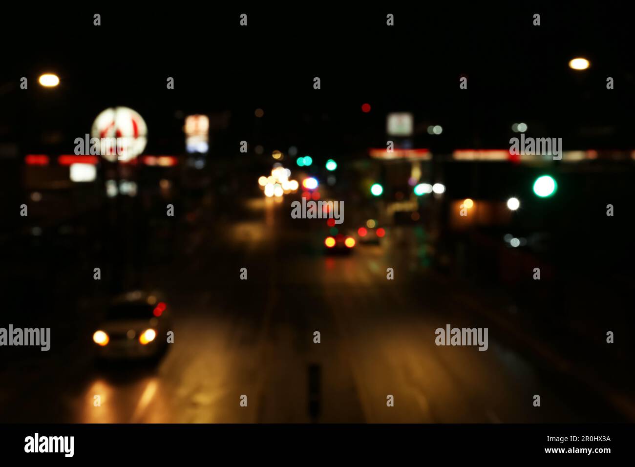 Blurred view of road with cars at night. Bokeh effect Stock Photo - Alamy