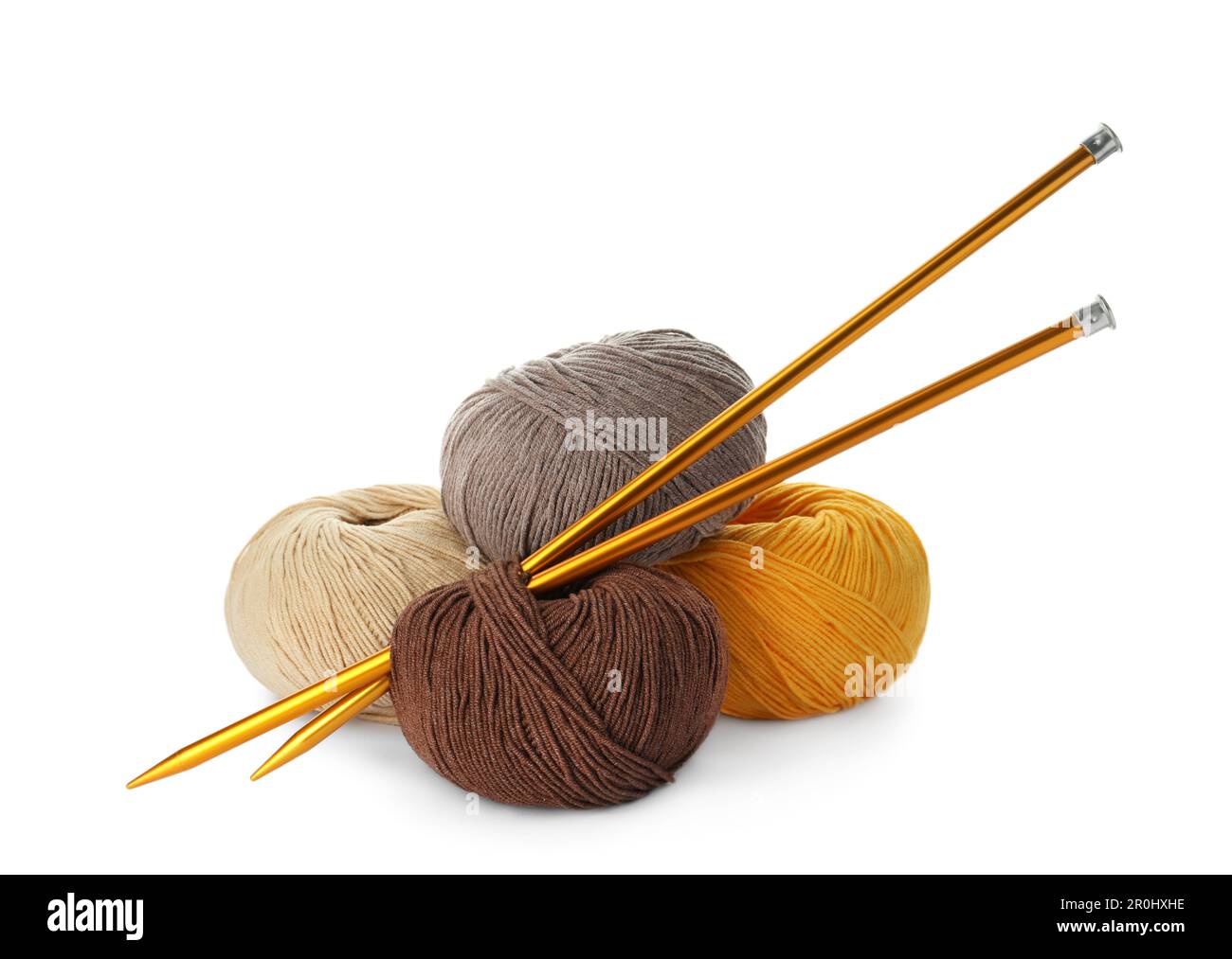 Soft woolen yarns and knitting needles on white background Stock Photo ...