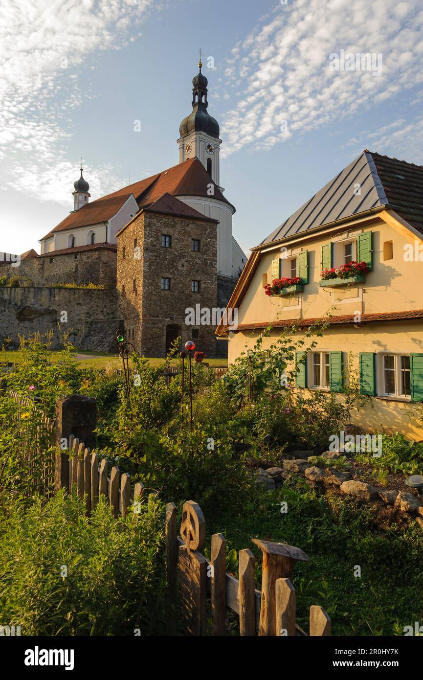 River Weisser Regen with church in the background, Bad Koetzting, Bavarian Forest, Bavaria, Germany Stock Photo