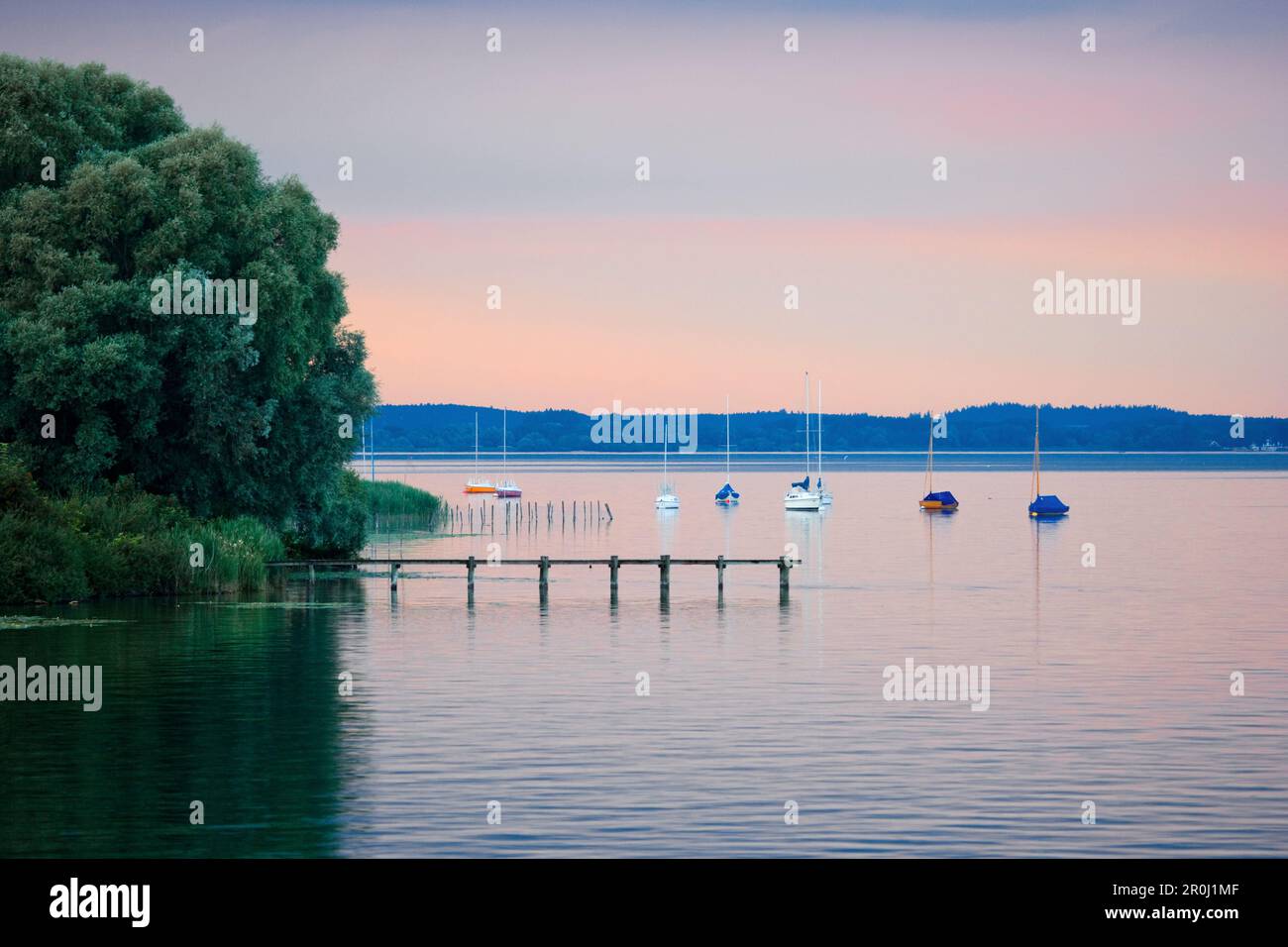 Wooden jetty on lake Ammersee, Diessen, Upper Bavaria, Bavaria, Germany Stock Photo