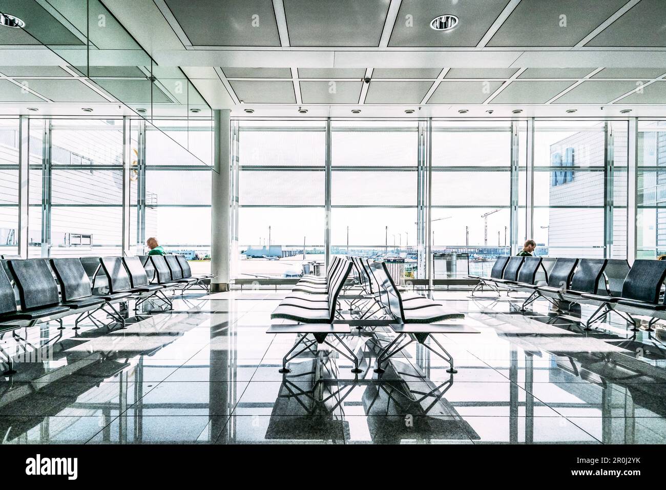 Passengers in waiting area hi-res stock photography and images - Alamy