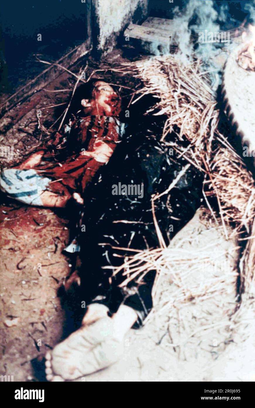 A mudered child at the Vietnamese village of My Lai after around 500 civilians were massacred by american troops during thh Vietnam War. Stock Photo