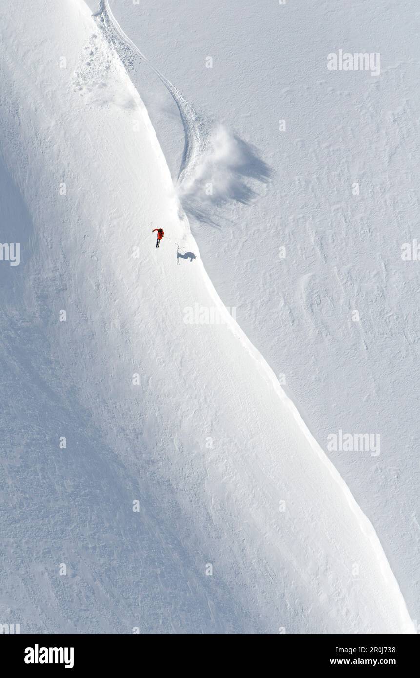 Freeskier jumping over cornice, Puma Lodge, Araucania Region, Chile Stock Photo