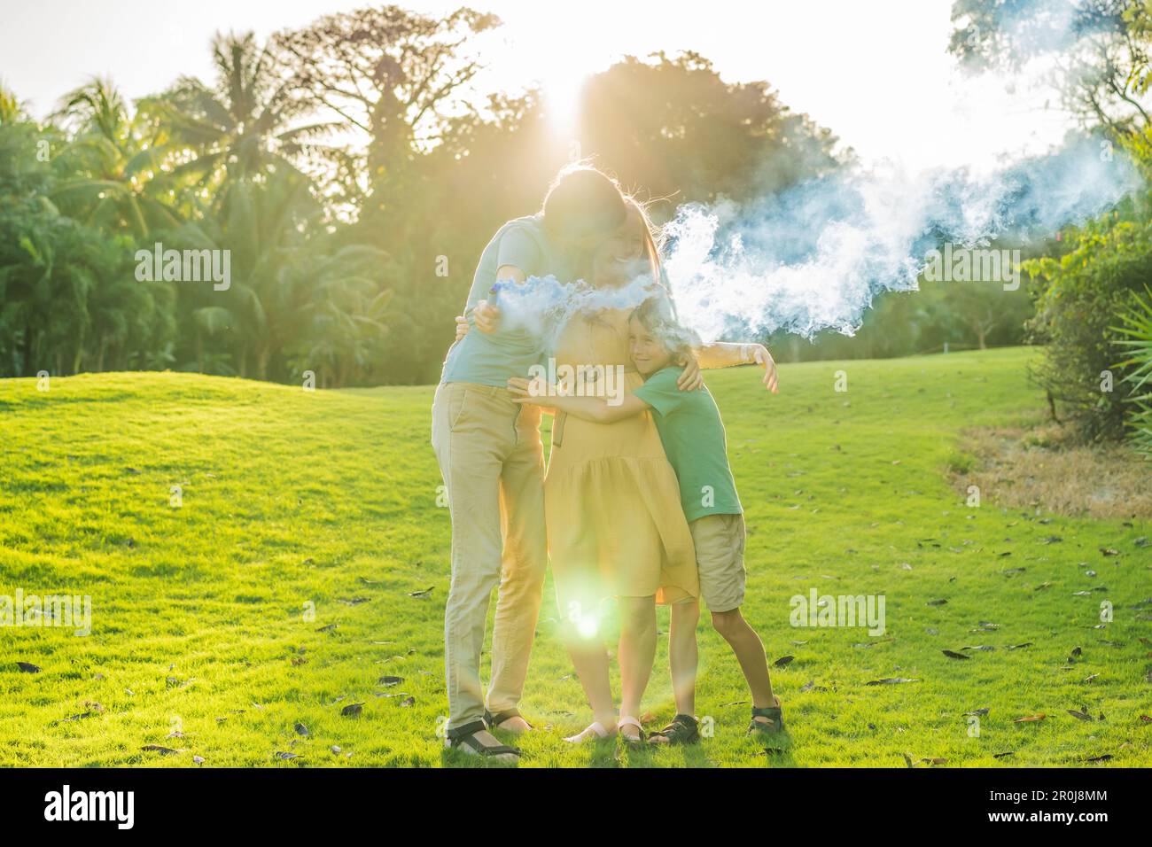 Pregnant mom, dad and son at the gender party on the golf course ...