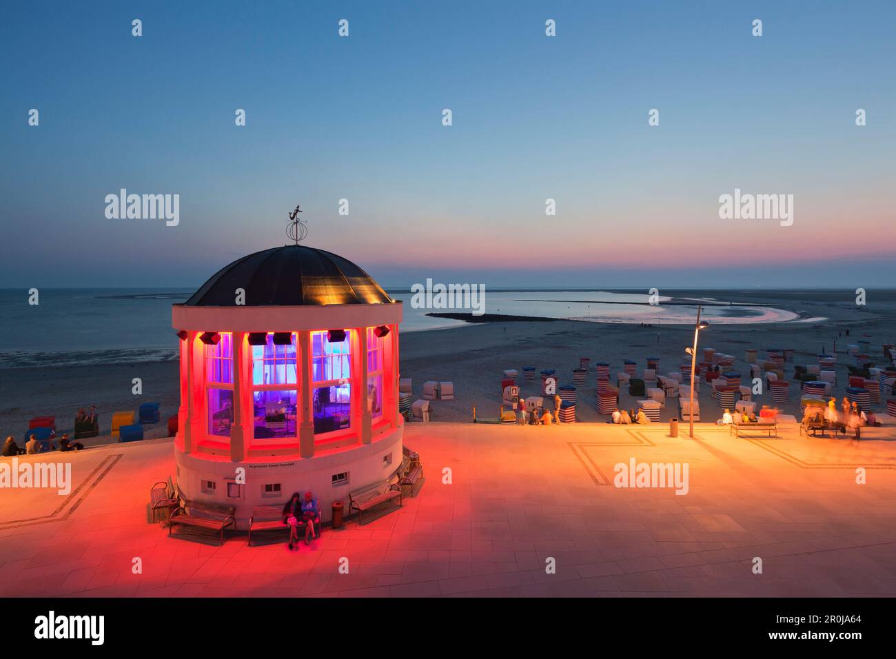 Illuminated pavilion on the beach promenade, Borkum, Ostfriesland, Lower Saxony, Germany Stock Photo