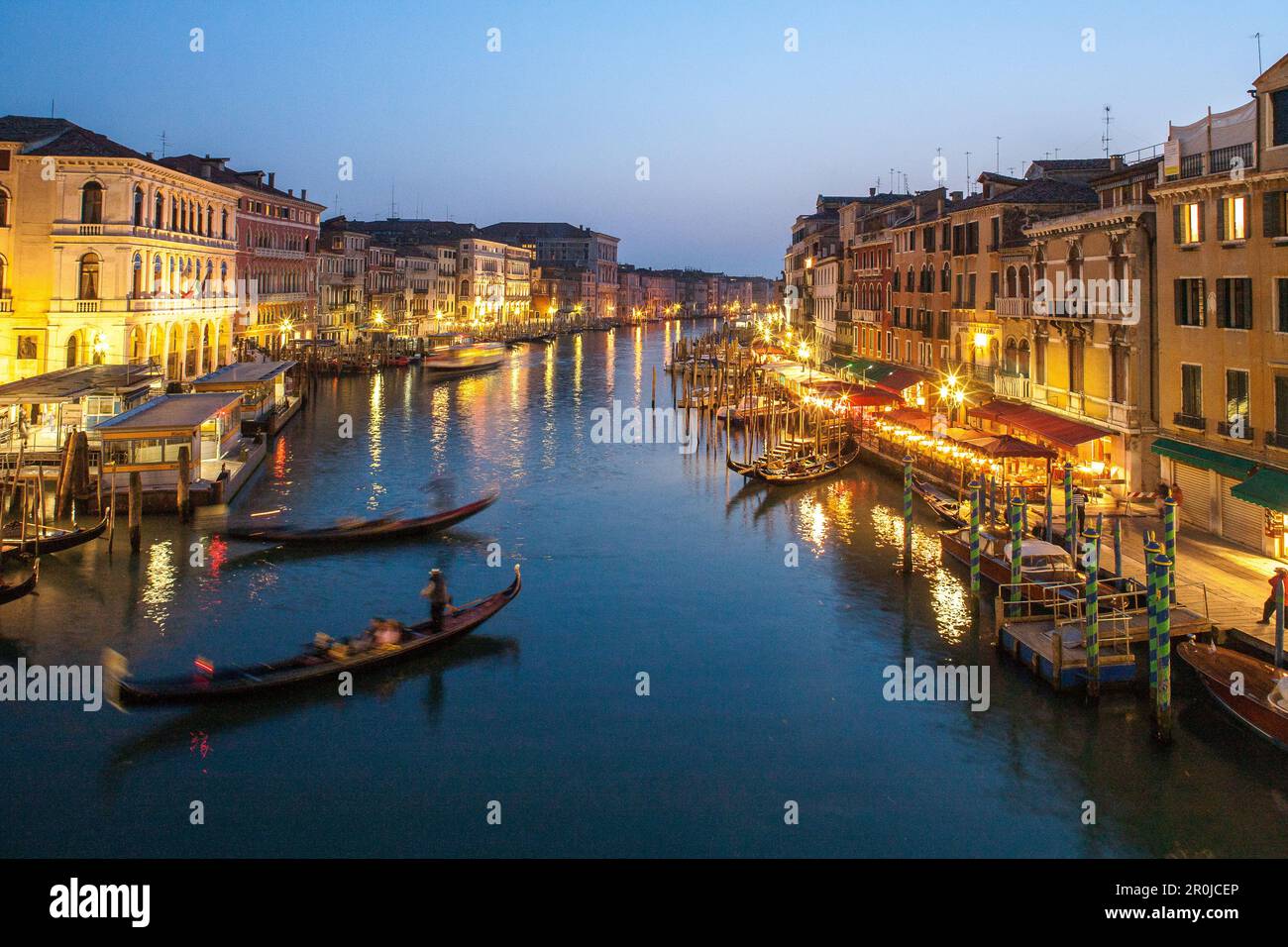 Grand Canal, twilight, reflections, gondola, lights, from Rialto Bridge, Venice, Italy Stock Photo