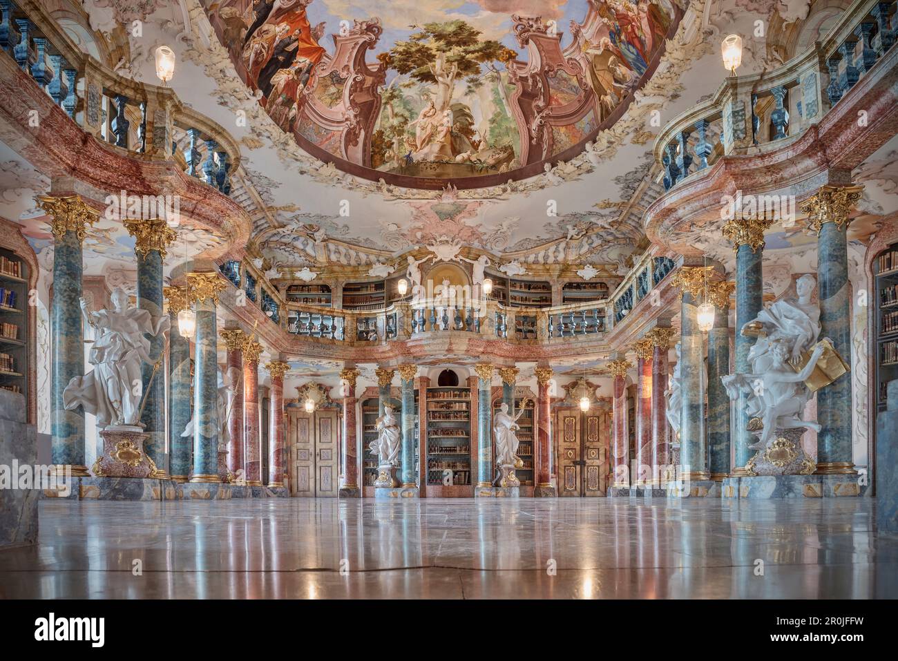 splendid library with columns, sculptures and ceiling frescos, Wiblingen Monastry, Ulm at Danube River, Swabian Alb, Baden-Wuerttemberg, Germany Stock Photo