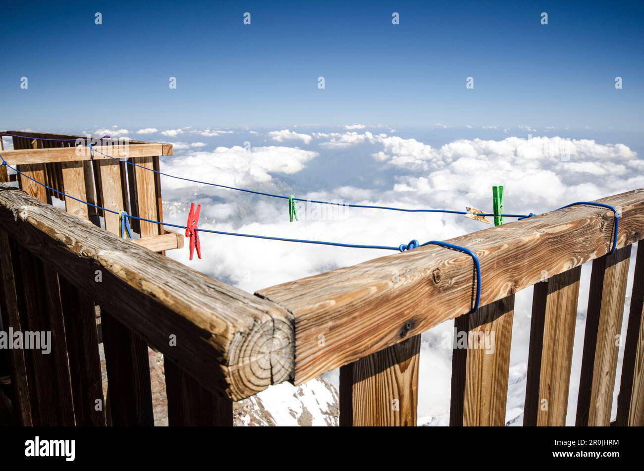 Clothes line and pegs in front of the Margherita Hut on the summit of the 4554 meter high Signalkuppe or Punta Gnifetti, highest hut in the Alps, belo Stock Photo