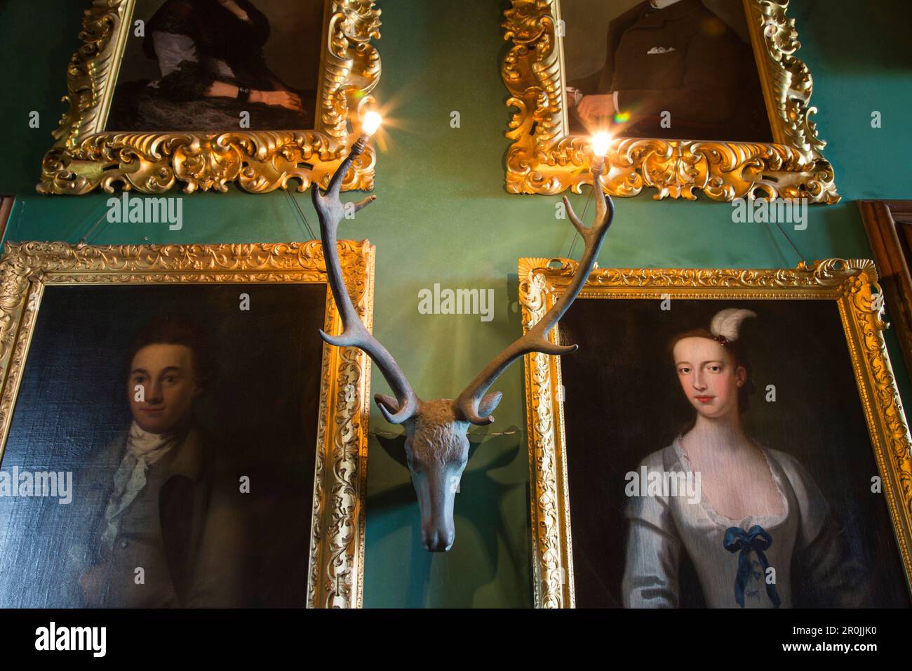 Stag lamp and paintings inside Balfour Castle country house hotel, Shapinsay Island, Orkney Islands, Scotland, United Kingdom Stock Photo