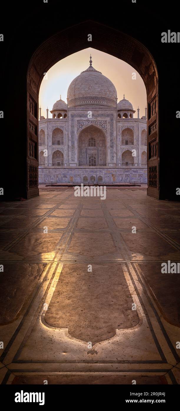 Taj Mahal through Archway Sunrise, Agra India Stock Photo