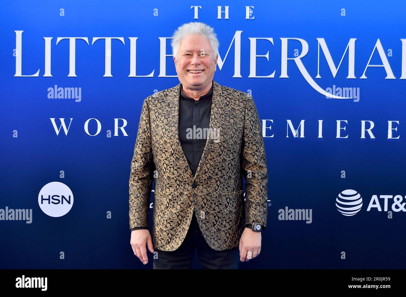 Alan Menken arrives at the world premiere of "The Little Mermaid" on