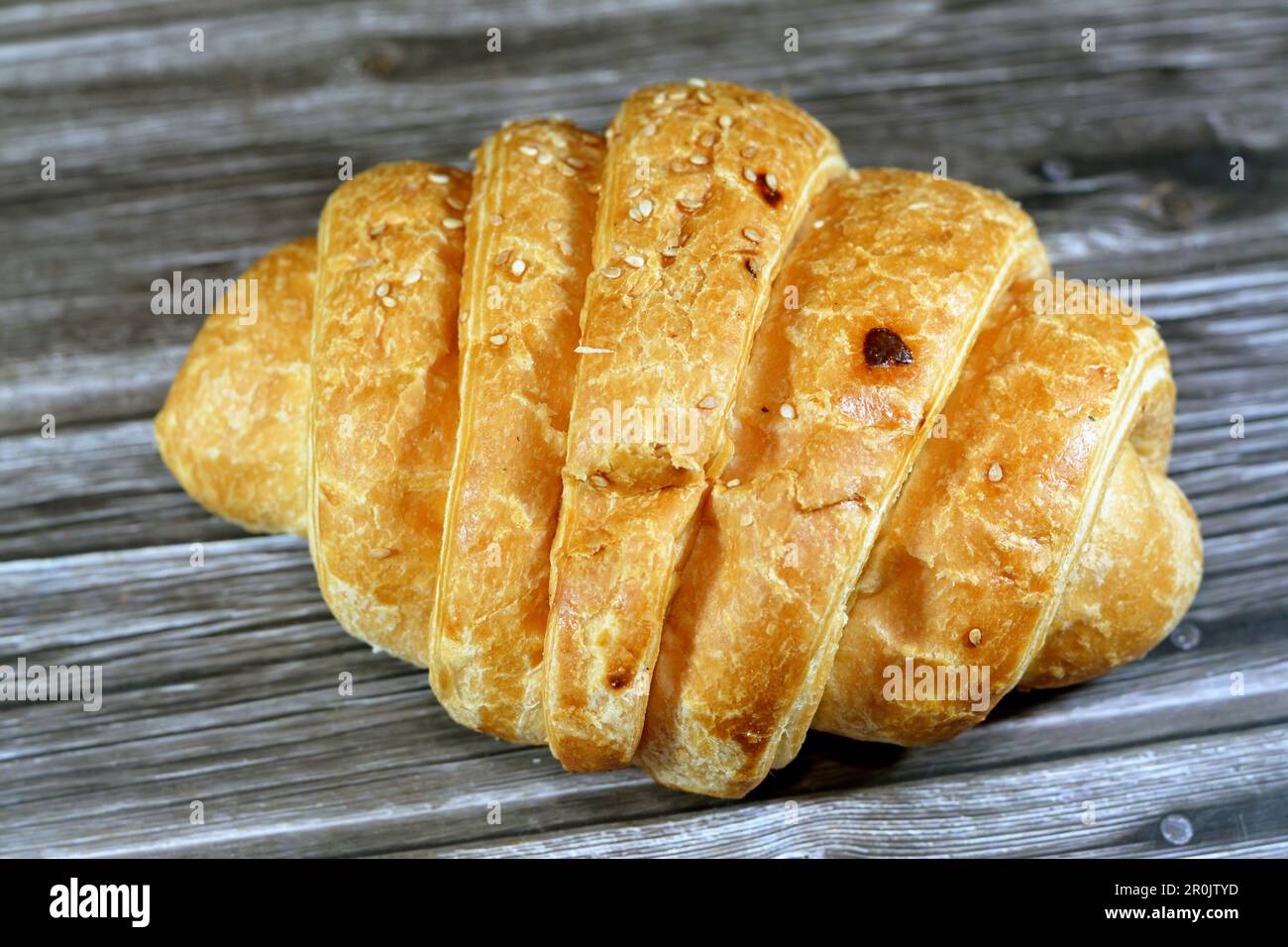 A croissant, a buttery, flaky, viennoiserie pastry, inspired by the