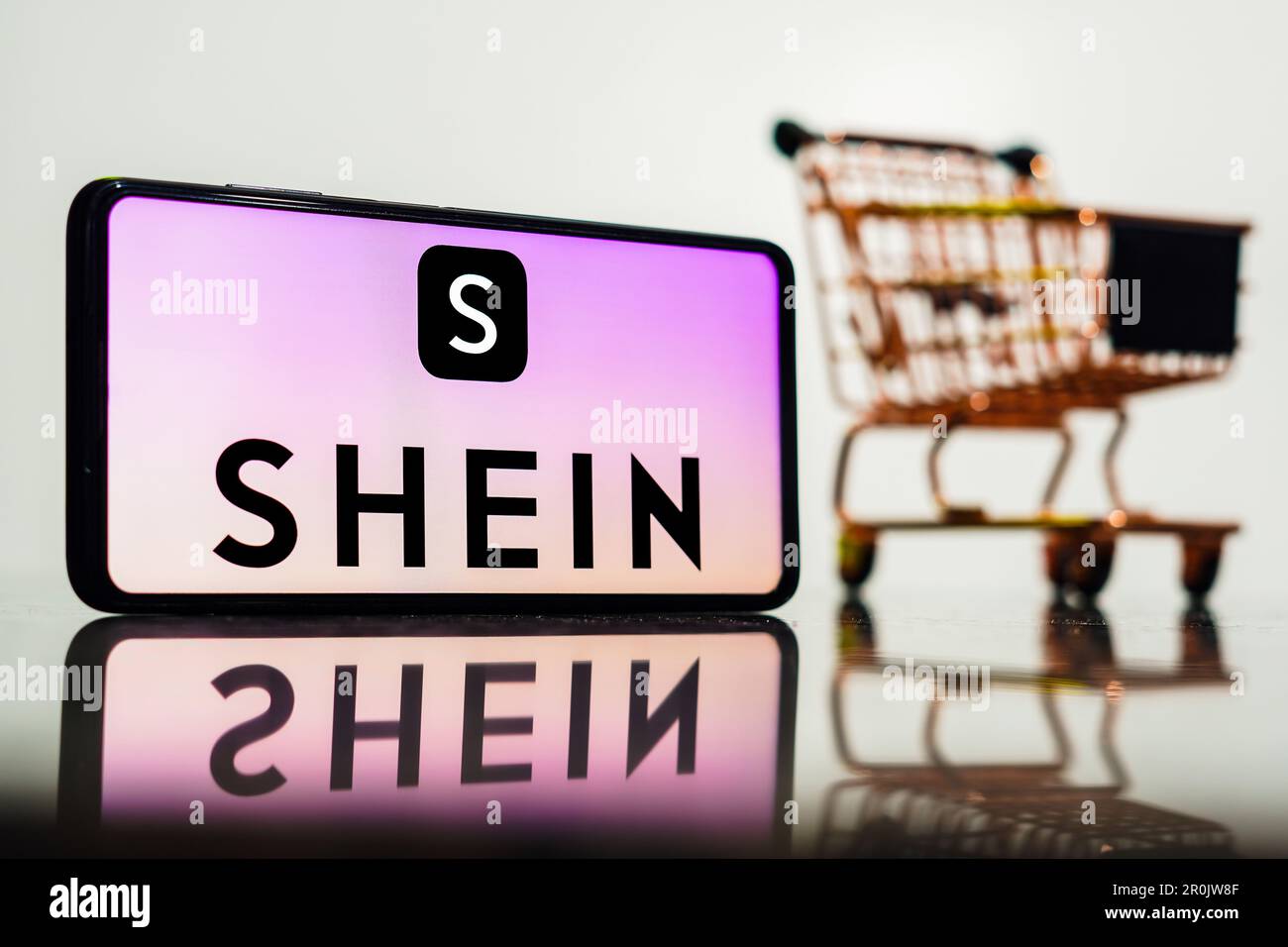 https://c8.alamy.com/comp/2R0JW8F/brazil-08th-may-2023-in-this-photo-illustration-the-shein-logo-seen-displayed-on-a-smartphone-along-with-a-shopping-cart-credit-sopa-images-limitedalamy-live-news-2R0JW8F.jpg