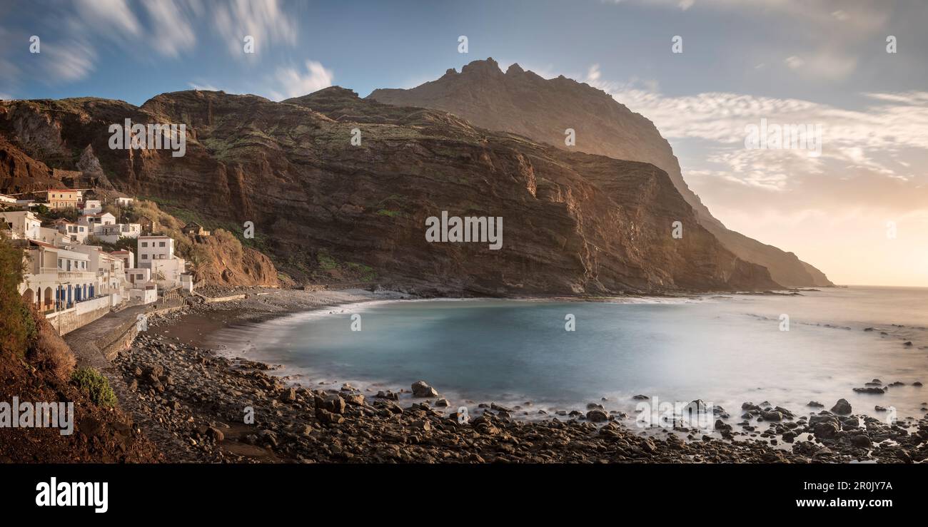 holiday facilities and restaurants at rocky bay Playa de Alojera, La Gomera, Canary Islands, Spain, long time exposure Stock Photo