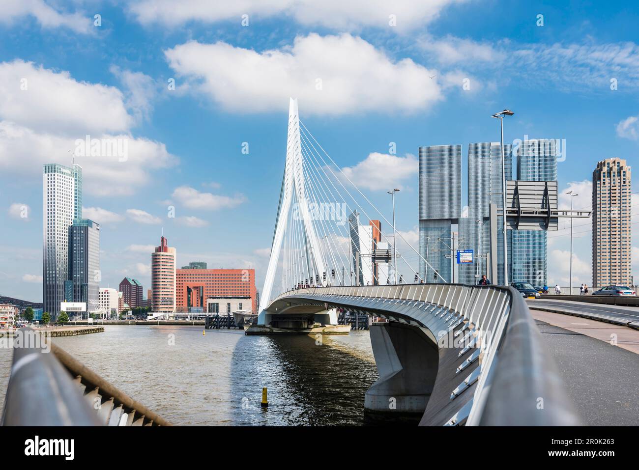The Erasmus bridge with view to the skyline and high rise buildings on ...