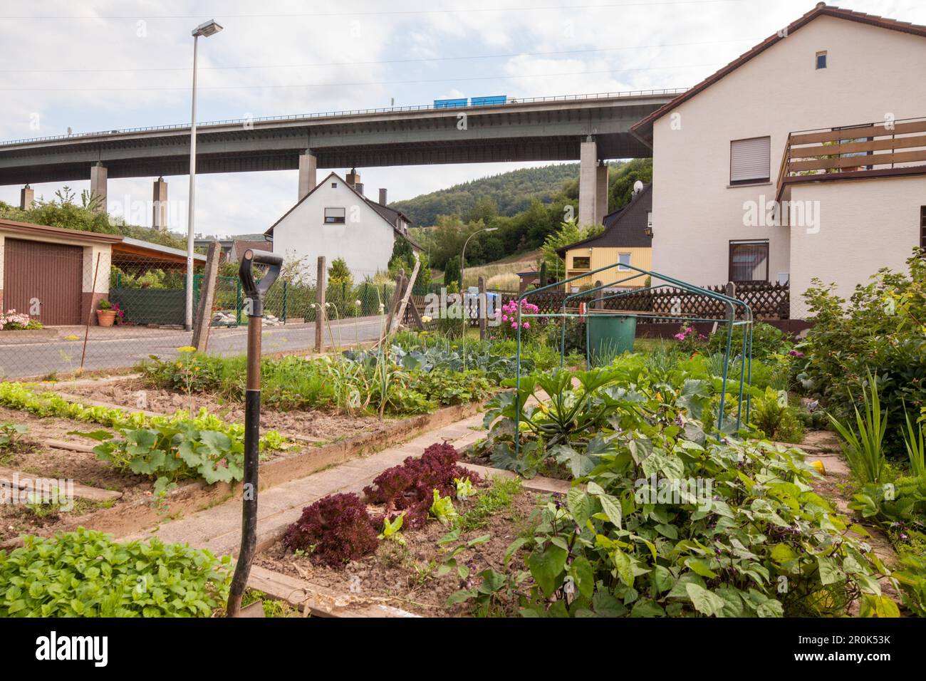 German Autobahn, house and garden below the A 3, motorway, highway