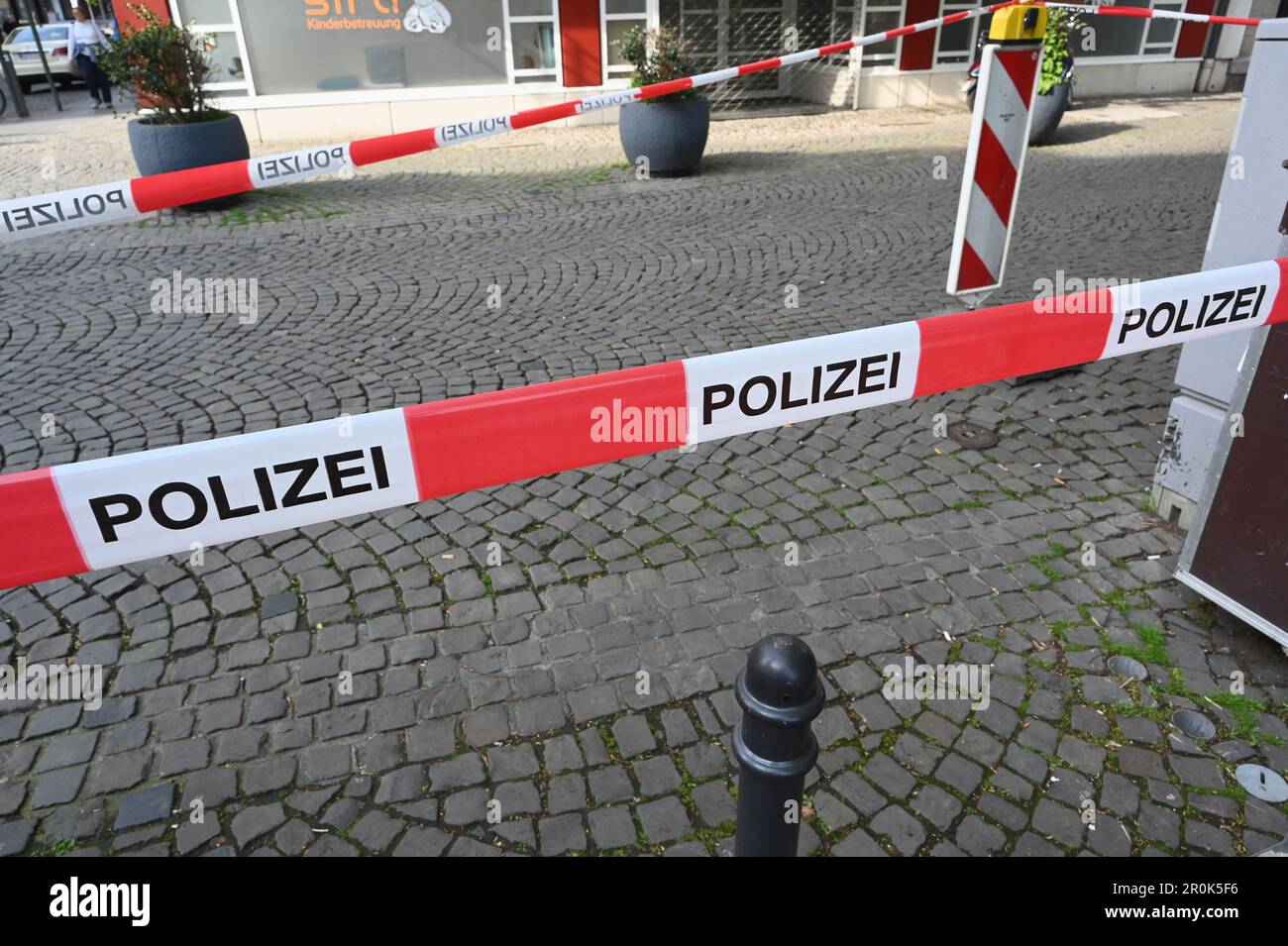 Cologne, Germany. 08th May, 2023. red white barrier tape with the inscription POLICE Credit: Horst Galuschka/dpa/Horst Galuschka dpa/Alamy Live News Stock Photo