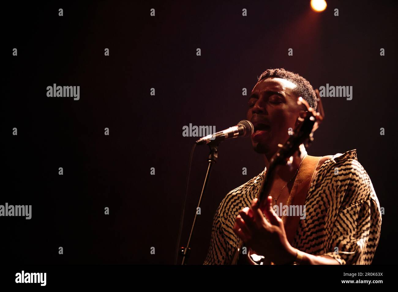 Toronto, Canada. 08th May, 2023. Joseph Solomon sings into a microphone ...