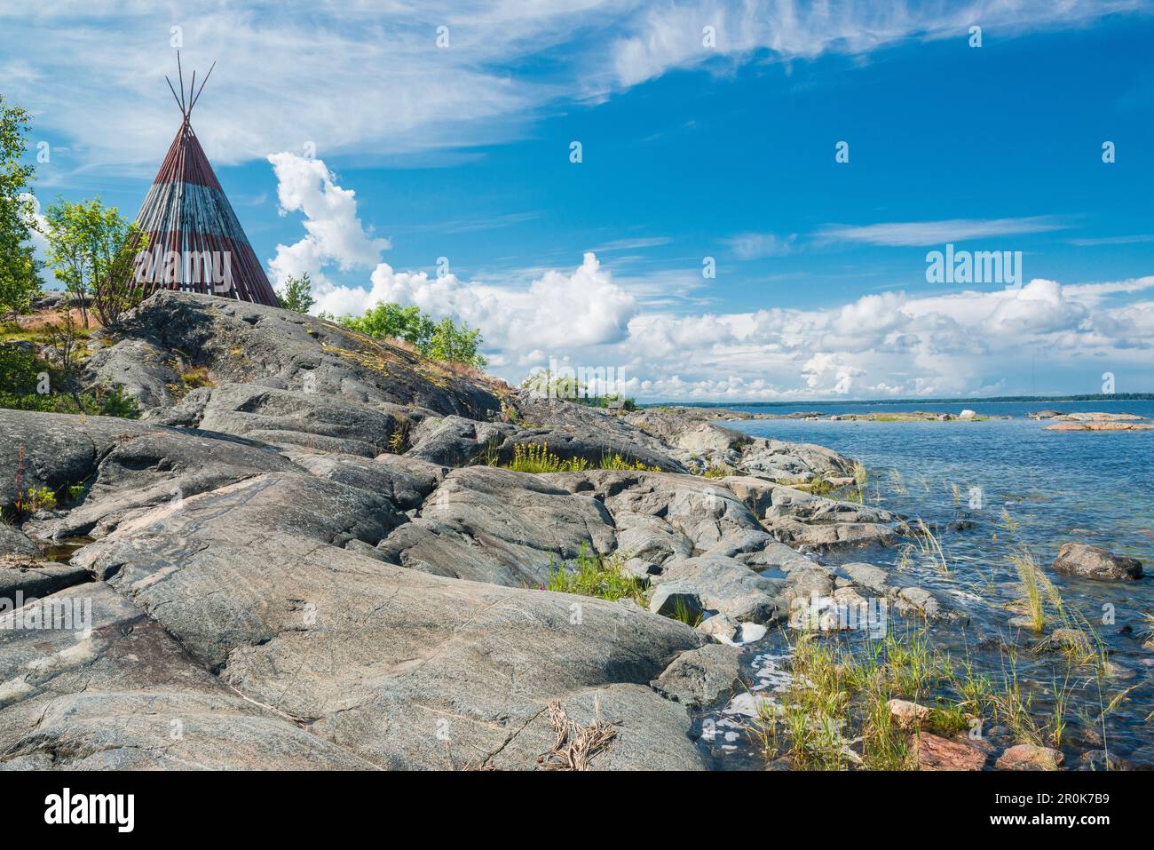 wooden tent standing on the rocks at the waterfront, Oregrund, Uppsala, Sweden Stock Photo