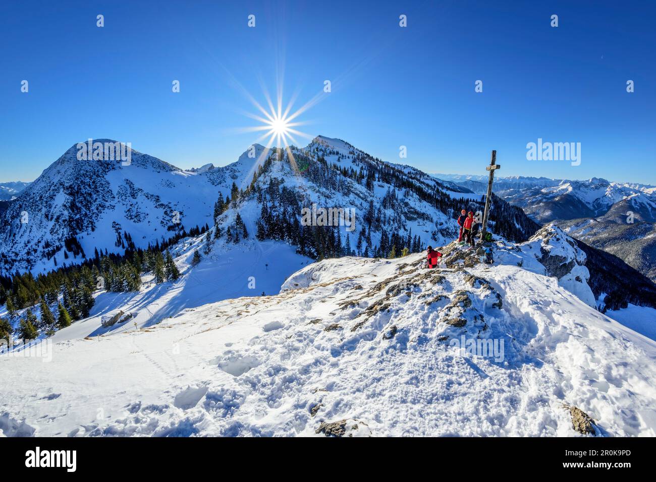 Several persons standing at summit of Taubenstein, Taubenstein, Spitzing, Bavarian Alps, Upper Bavaria, Bavaria, Germany Stock Photo