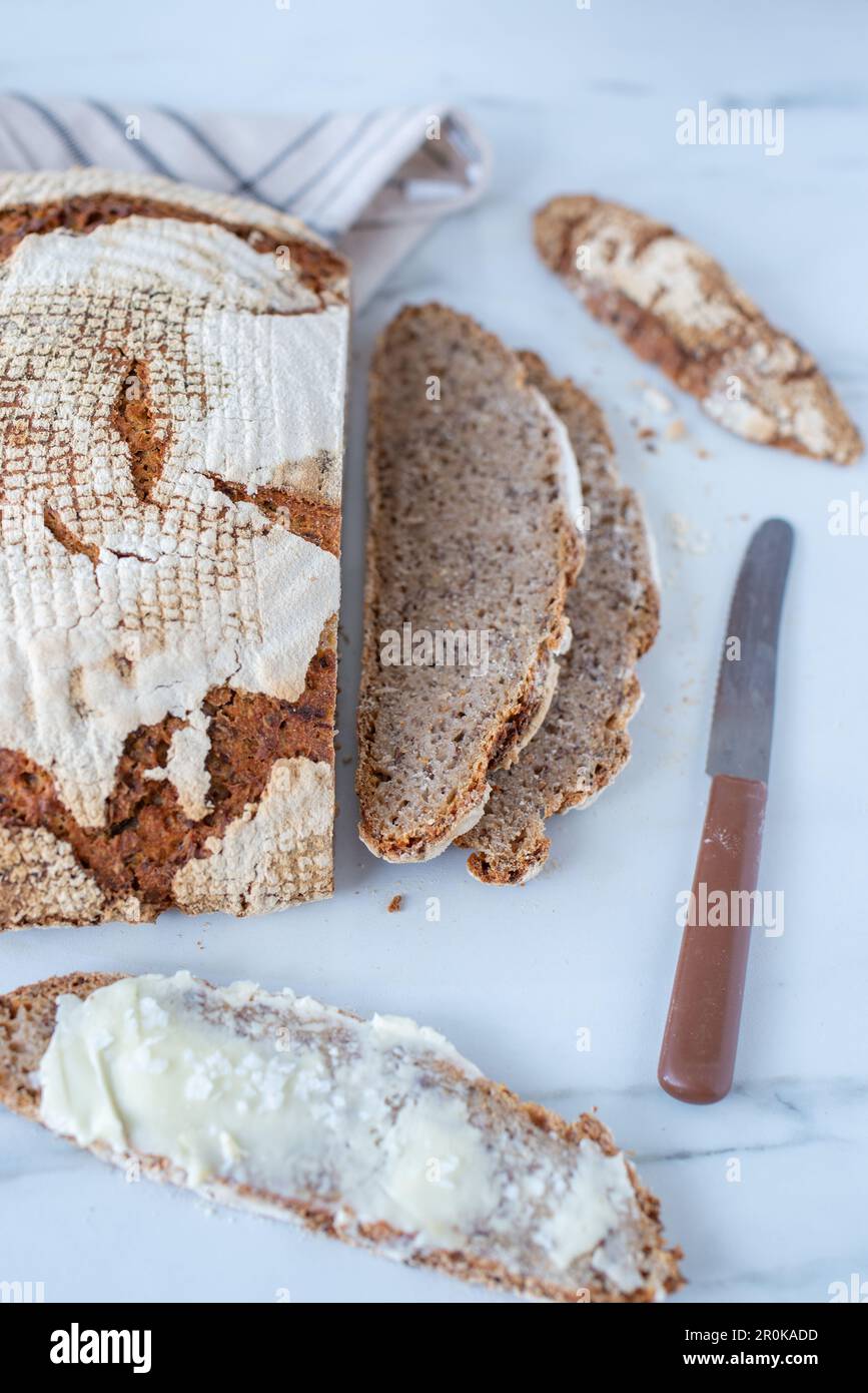 Home made whole grain bread on rustic wooden Stock Photo - Alamy