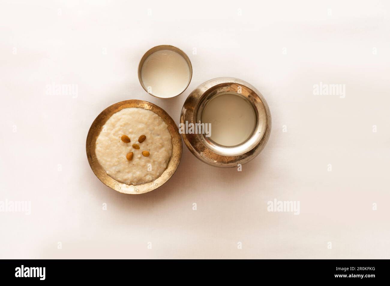 Delicious Kheer with glass of milk, Traditional indian sweet dish, Pakistani dessert. top view Stock Photo