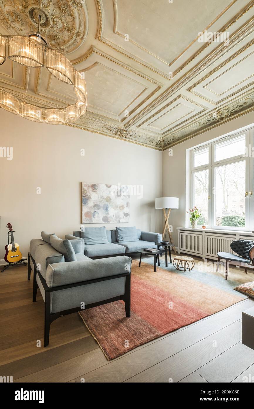 Living room in a modern furnished Art Nouveau apartment in Hamburg
