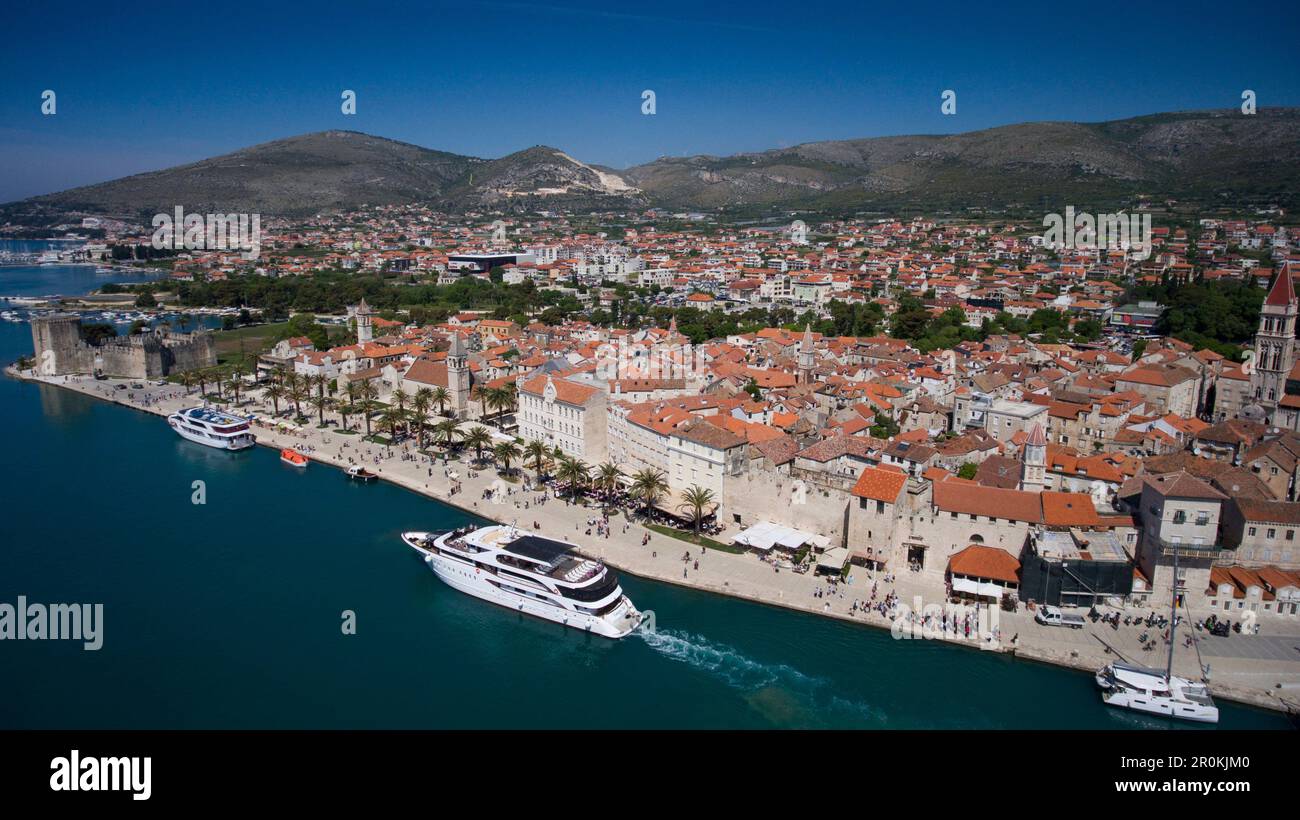Aerial of cruise ship MS Romantic Star (Reisebüro Mittelthurgau) and Old Town rooftops, Trogir, Split-Dalmatia, Croatia Stock Photo